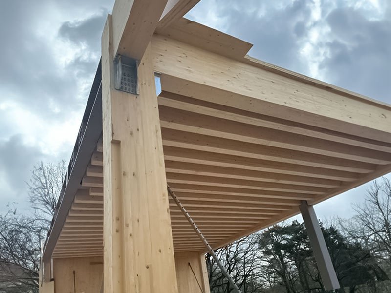 Ontdek de voordelen van moderne houten constructies. Duurzaam, energiezuinig en comfortabel. Kies voor een milieuvriendelijke bouwmethode met zorgvuldig geselecteerd hout.